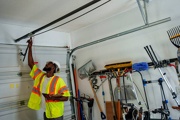 Professional Garage Door Panel Replacement technician working in Chandler, OK